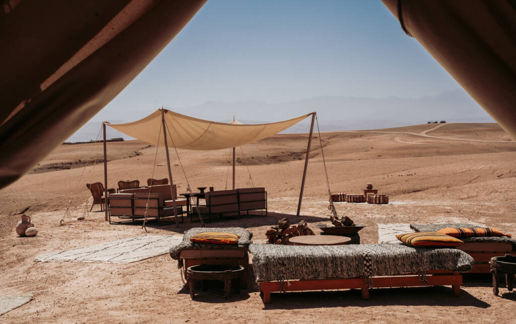 Private luxury desert camp in Merzouga, Morocco with tents, camel treks, and starry skies for an exclusive Sahara experience