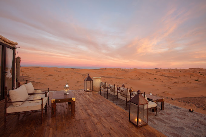 Luxury tea setup in the Moroccan desert dunes with private desert experience