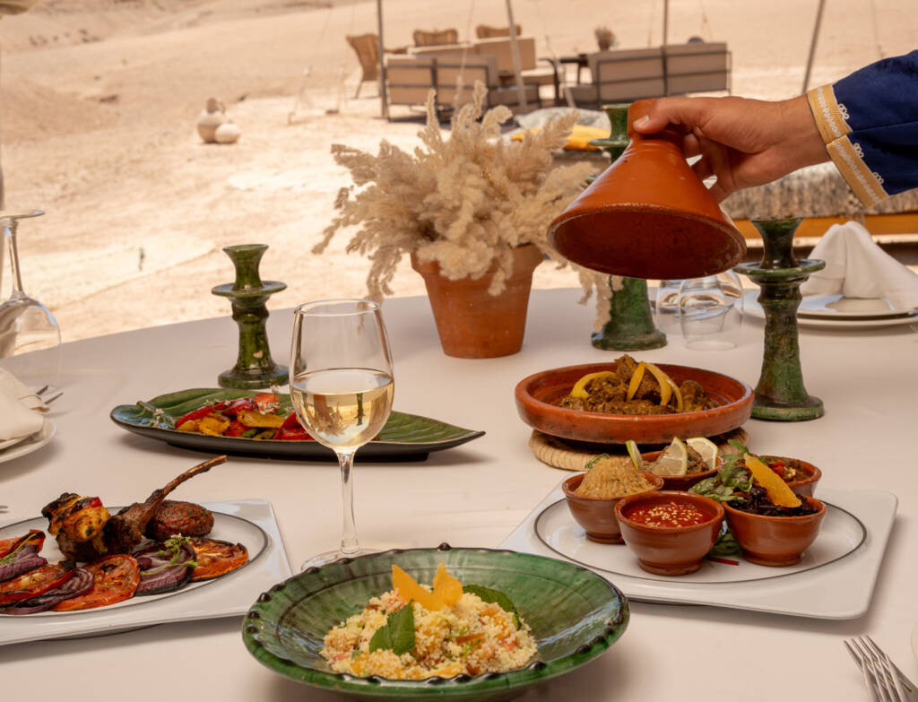 Exclusive private dining experience in the Agafay Desert, elegantly set and curated by Morocco Luxury Highlights