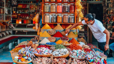 Spice stalls in the Marrakech souks, explored with a private guide