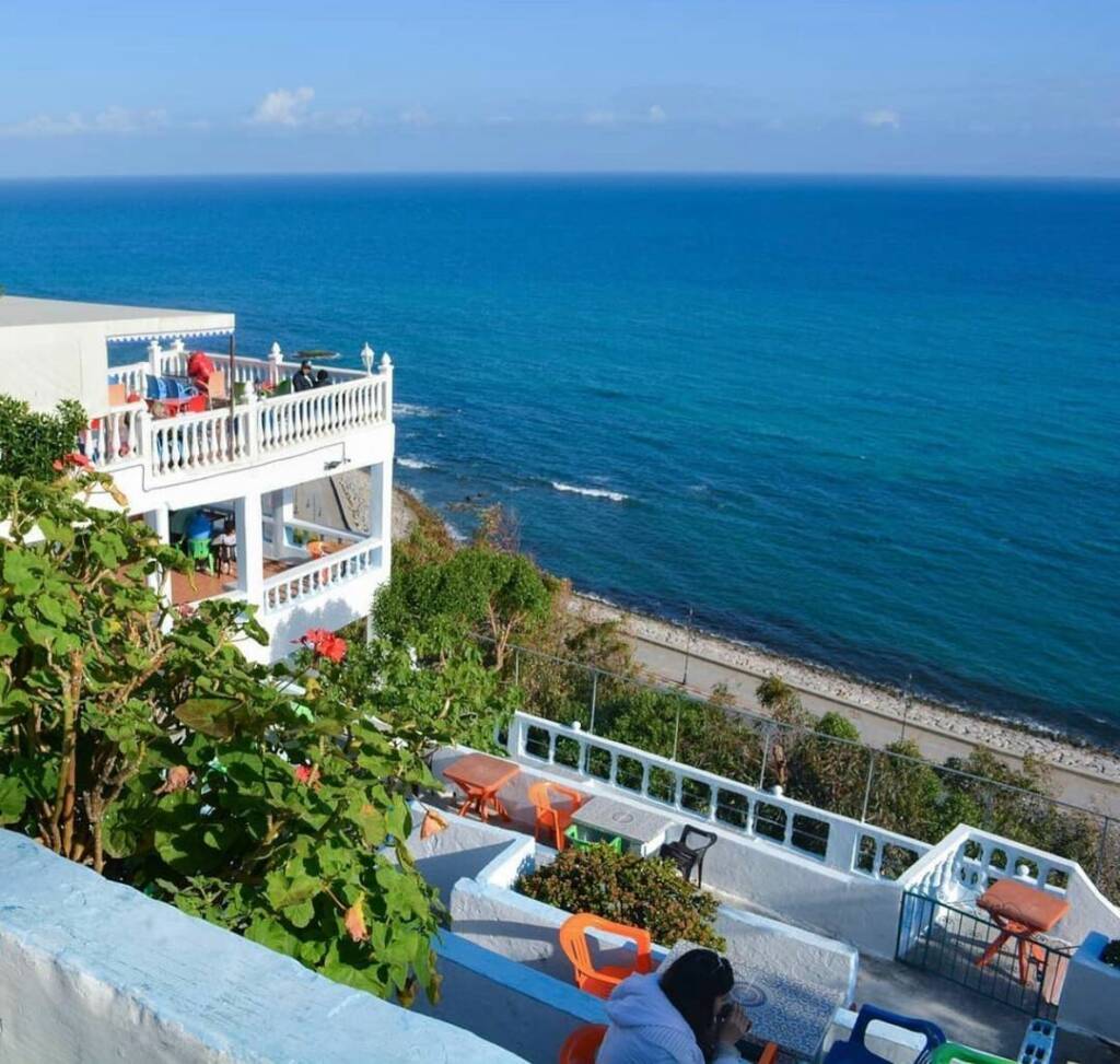 Terraces of Café Hafa overlooking the sea, a historic cultural landmark of Tanger.
