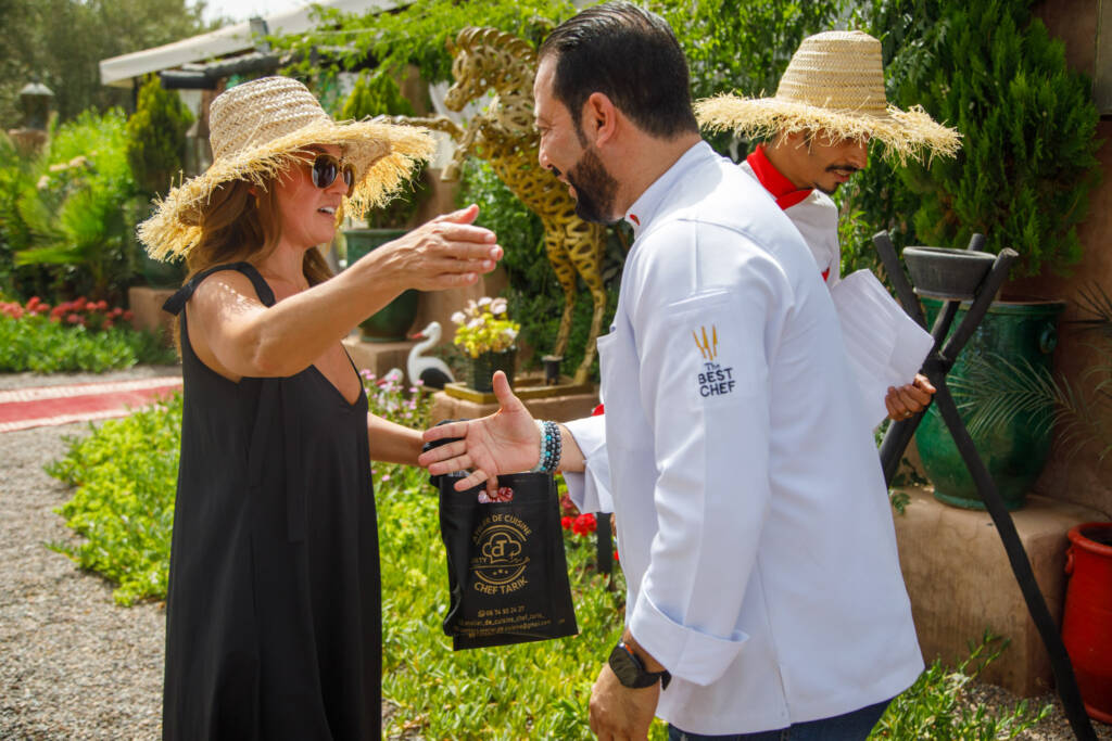 Family participating in a private Moroccan cooking during a family tour
