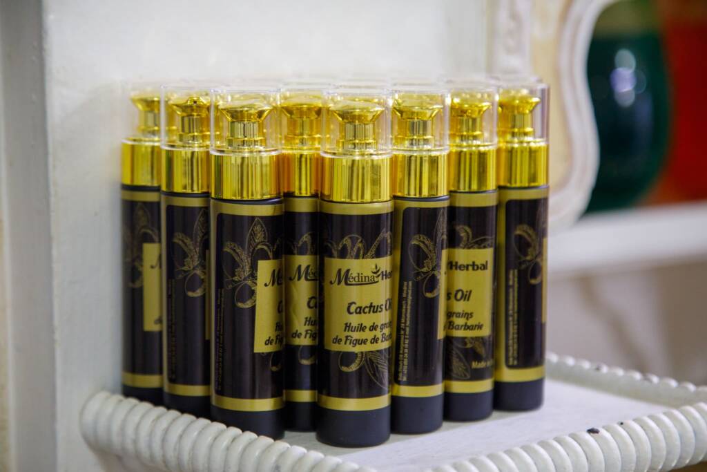 Pure Moroccan argan oil produced by a women’s cooperative, highlighting what to buy in Morocco for natural beauty and wellness