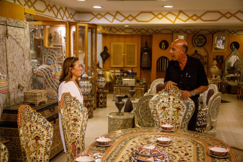 Handcrafted Moroccan artisan table showcasing what to buy in Morocco, featuring traditional woodworking and intricate design