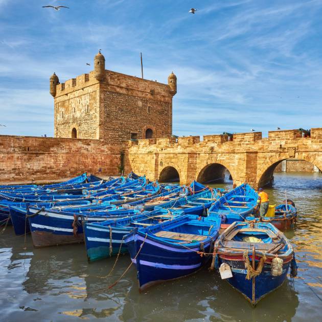 Fishing boats in Essaouira harbor – luxury Morocco travel experiences, bespoke seaside tours, deluxe trips Morocco